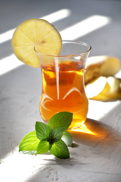 Morning ginger tea with mint and lemon . stock photo
