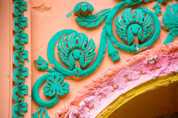istock Red, Orange, yellow and blue color combination old Textured damage wall with Colorful Bricks. 1185567309