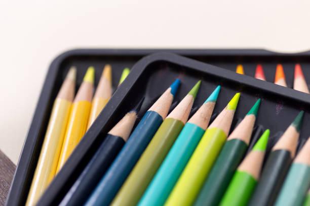 istock Bunch of random colored pencils, close up macro. White background 1185570309