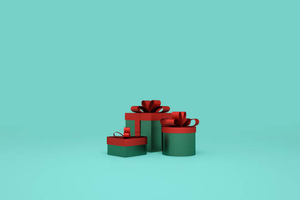 istock green gift box on blue background. minimal christmas concept idea. 3d rendering 1185574895