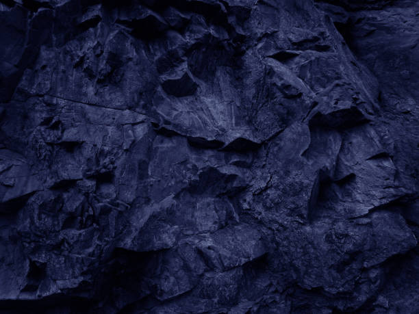 istock Abstract blue grunge background. Navy blue rock texture. Mountain close-up. 1185580831