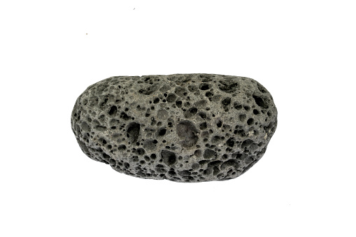 Gray pumice stone with rough surface isolated on white background