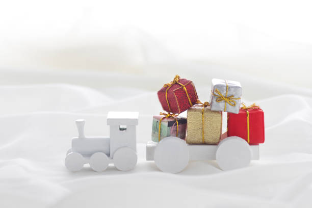 istock Santa Claus comes with a present on the train 1185585736