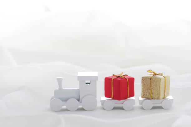 istock Santa Claus comes with a present on the train 1185585741
