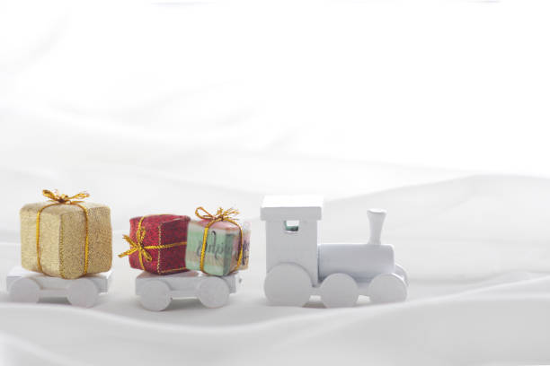 Santa Claus comes with a present on the train