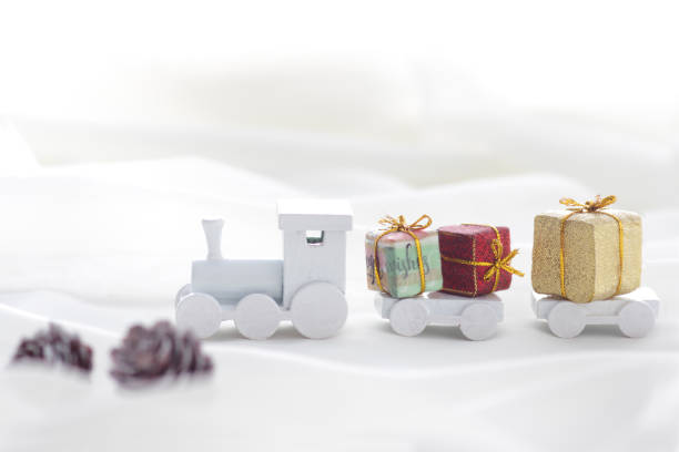 istock Santa Claus comes with a present on the train 1185585849