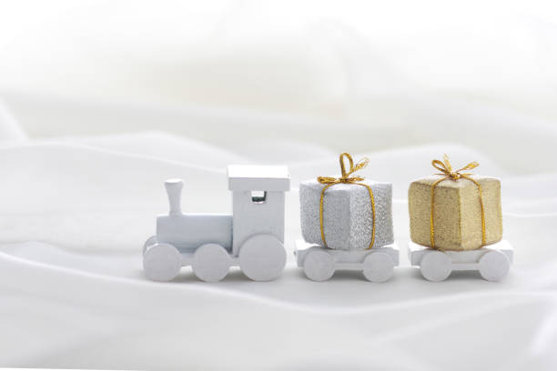 istock Santa Claus comes with a present on the train 1185585872