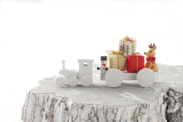 istock Santa Claus comes with a present on the train 1185588890