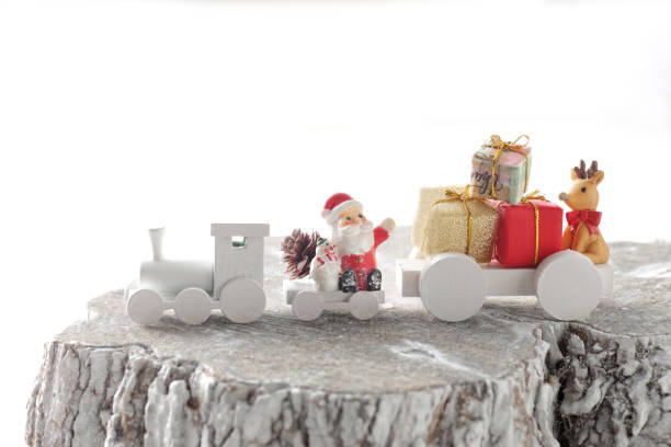 istock Santa Claus comes with a present on the train 1185588891