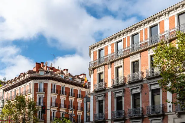 Photo of Old luxury residential buildings with balconies in Serrano Street in Salamanca district in Madrid