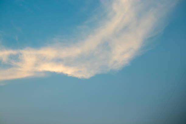 istock Abstract blurred background Blue sky with white clouds in sunlight 1185593268