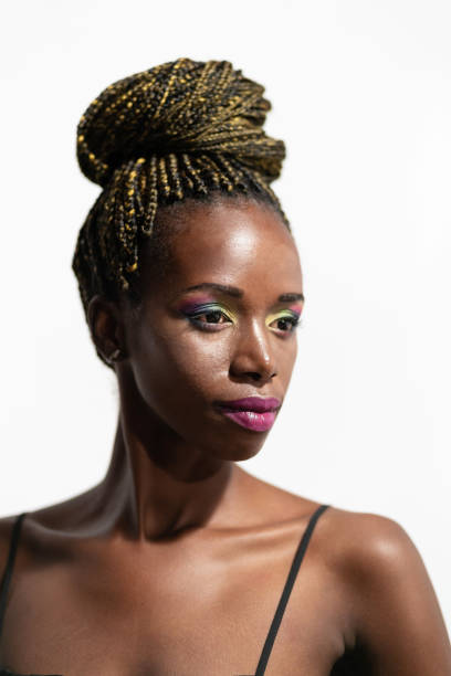 istock Pensive african woman on white background 1185596798