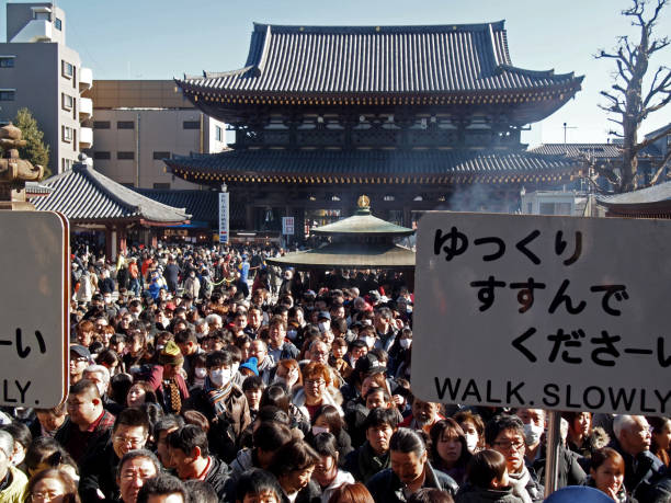 Kawasaki in Kanagawa, Japan 01/03/2018Temple where 3 million people visit New Year 's worship.The landscape of the people walking towards the main shrine.