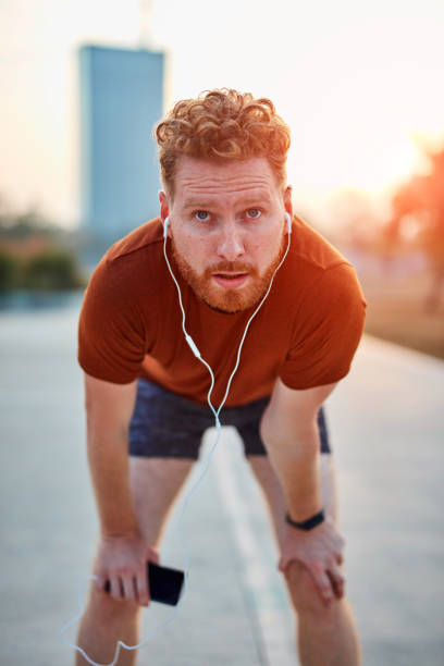 istock Modern young man working out in an urban park. 1185607791