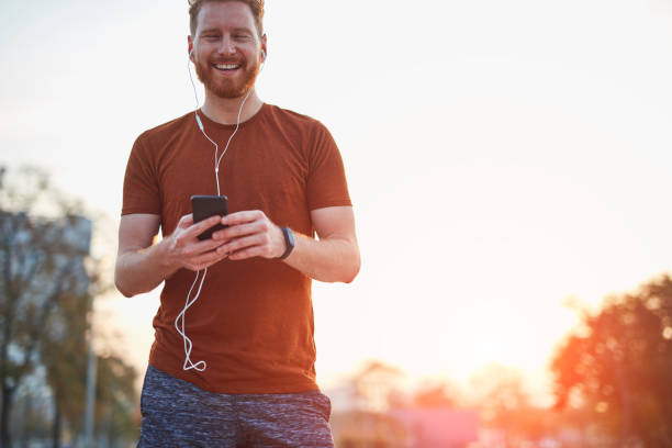 istock Modern young man working out in an urban park. 1185607995
