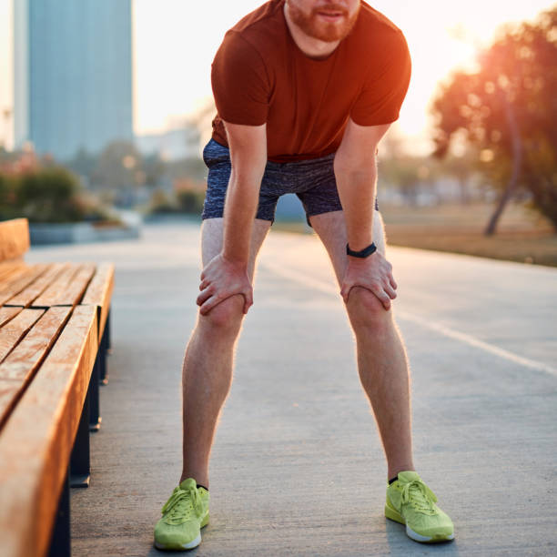 istock Modern young man working out in an urban park. 1185608006