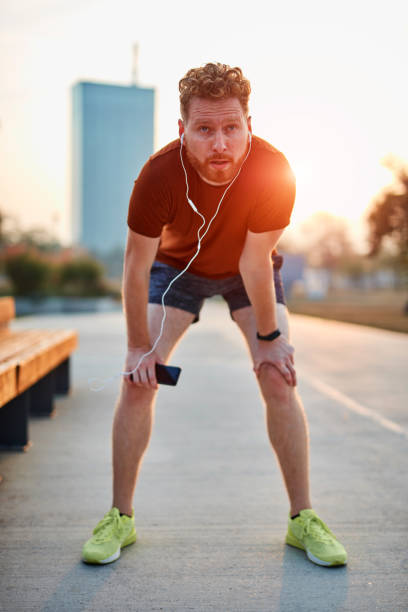 istock Modern young man working out in an urban park. 1185608037