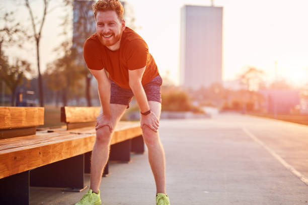 istock Modern young man working out in an urban park. 1185608886