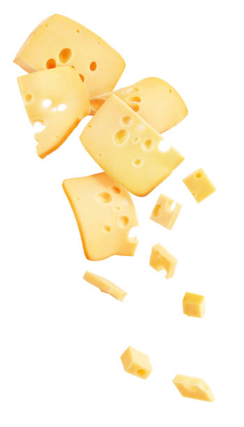 istock Hard cheese cut into strips and cubes isolated on a white background 1185609096