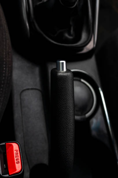 istock Mechanical parking brake handle in car 1185609709