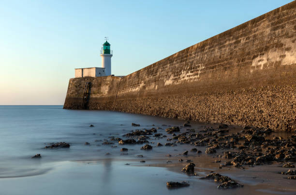 istock Lighthouse of Les Sables d'Olonne at low tide 1185610034