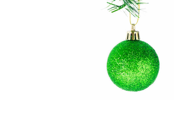 vintage green christmas ball hangs isolated on a white background. christmas glitter. - vibrant color new traditional culture saturated color imagens e fotografias de stock