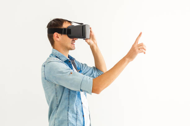 istock Young man with virtual reality glasses. Modern technologies. The concept of future technology. 1185613825