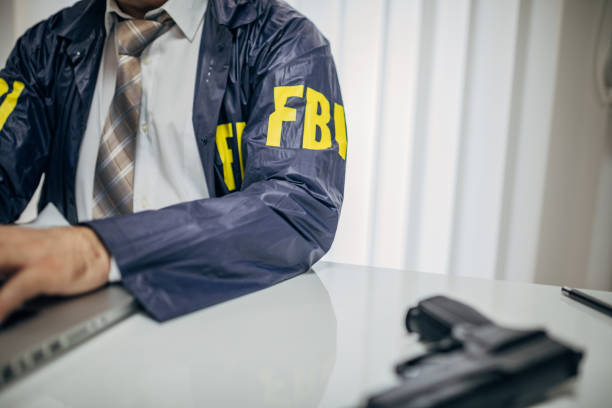 istock An FBI agent uses a laptop 1185615896