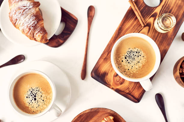 istock breakfast pattern, croissant, coffee, honey, cinnamon sticks, nuts, sugar. Good morning concept. 1185616559