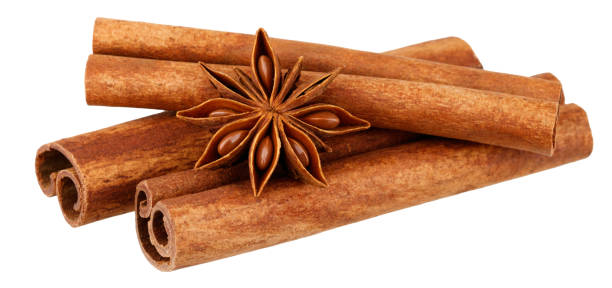 istock Cinnamon sticks with star anise isolated on white background 1185616575