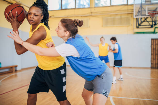 istock Women playing basketball 1185617242