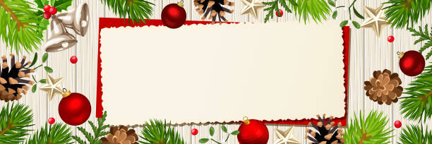istock Christmas banner with fir branches, balls and cones on a wooden background. Vector header. 1185618091