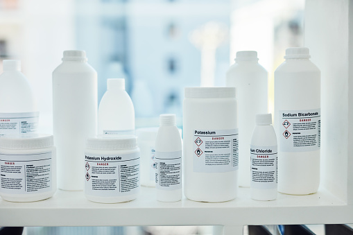 Closeup shot of bottles of chemicals in a lab