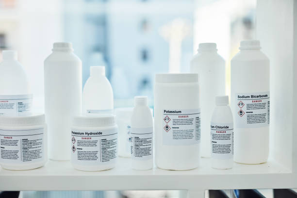 Be careful when working with chemicals Closeup shot of bottles of chemicals in a lab brics photos stock pictures, royalty-free photos & images