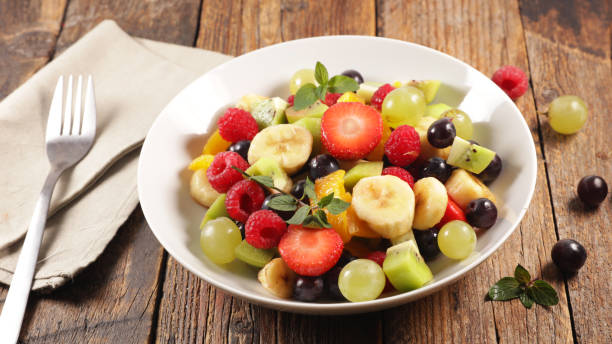 istock fresh fruit salad in bowl 1185622580