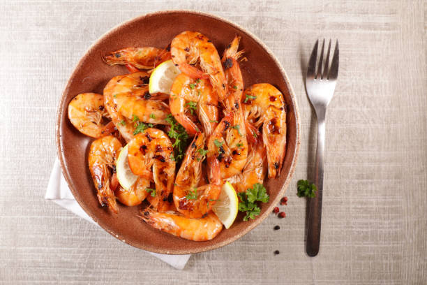 istock fried shrimp with garlic, ginger and herb 1185622750