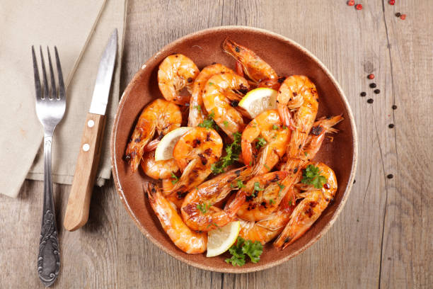 istock fried shrimp with garlic, ginger and herb 1185622756