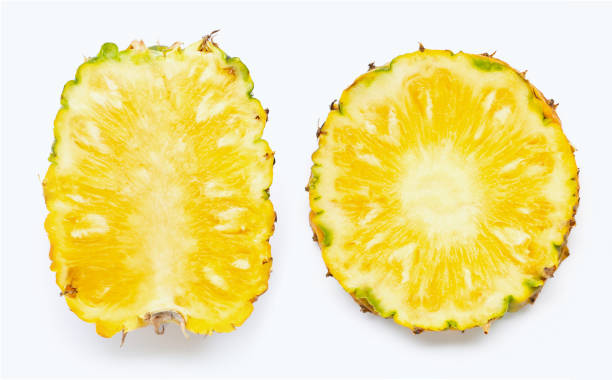 istock Pineapple slices on white. 1185623194