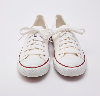 white sneakers shoes in the white background