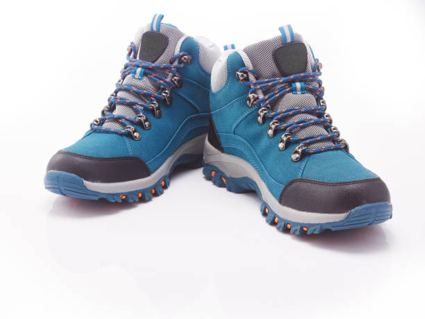 istock hiking boots modern blue color in the white background 1185624426