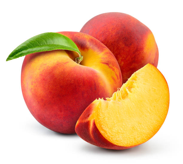istock Peach isolate. Peach with slice on white background. Full depth of field. With clipping path. 1185628689