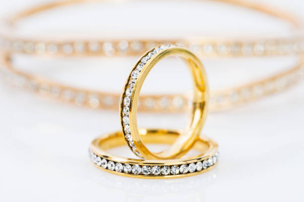 istock Gold wedding rings with diamond 1185629624