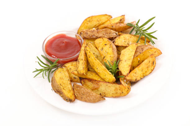 istock fried potato with tomato sauce, ketchup isolated on white background 1185629986