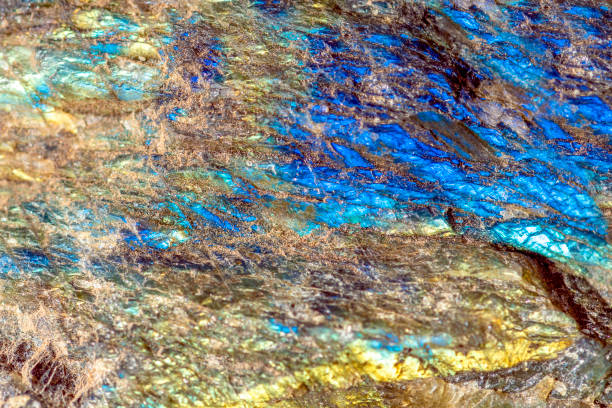 istock Macro shooting of gem raw natural Labradorite mineral texture as very nice natural background , 1185641181