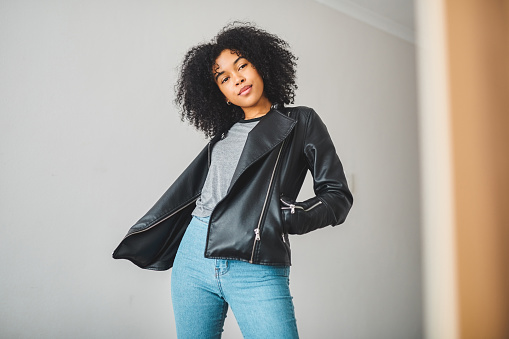 Mock up of black woman happy, smile and thinking with studio backdrop. A young, confident and relaxed stylish female looking, staring and focused on positive, happiness and empowerment or fun.
