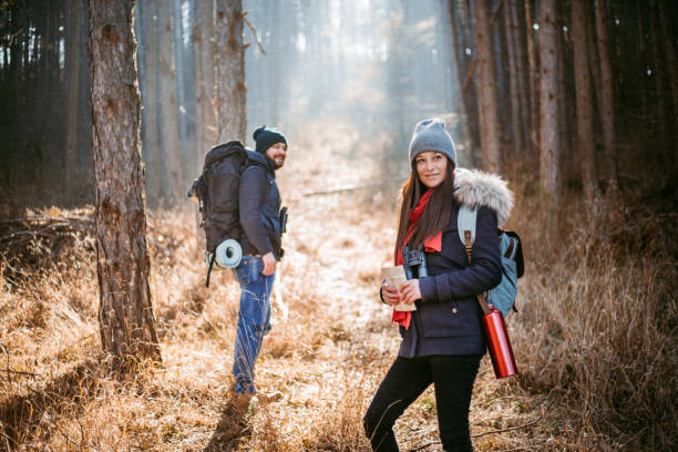 istock Young couple enjoying beautiful autumn forest in the mountains 1185641967