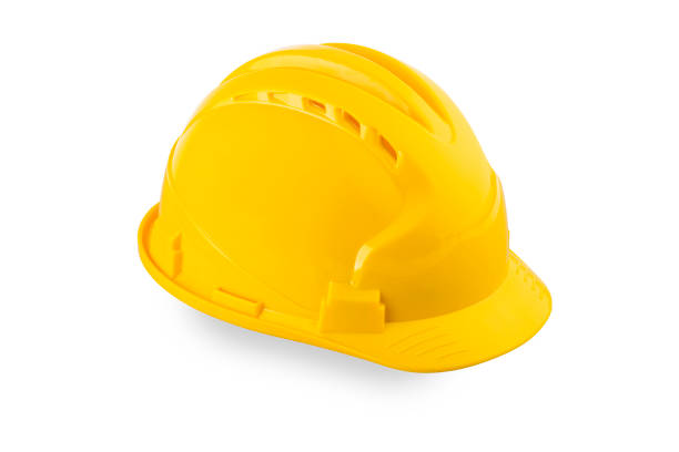 istock Yellow hard hat on white, Close up of bright yellow hard hat 1185644601