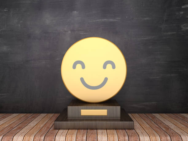 istock Trophy with Happy Emoticon on Wood Floor - Chalkboard Background - 3D Rendering 1185646473