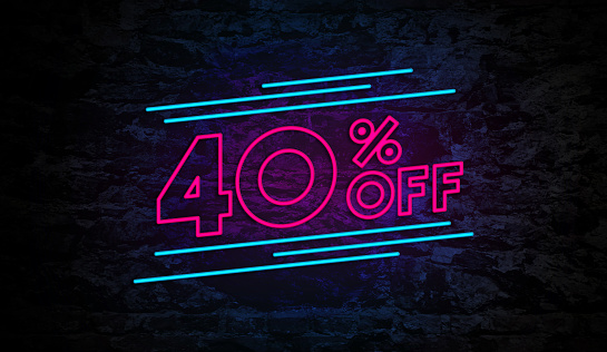 40% Off Discount Concept Neon Sign on Brick Wall Background
