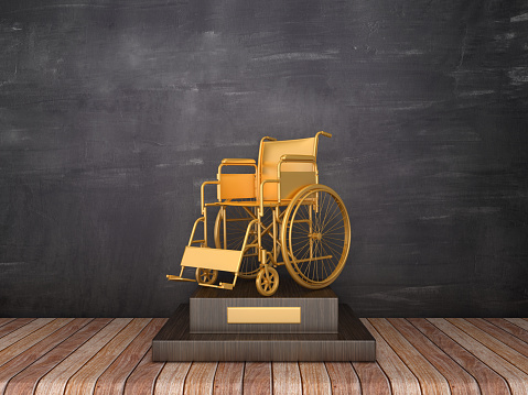 Trophy with Wheelchair on Wood Floor - Chalkboard Background - 3D Rendering